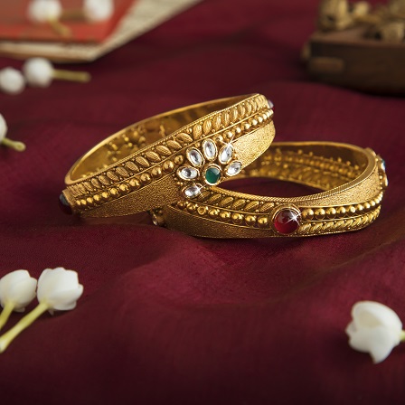 Hallmark gold bangles and kadas